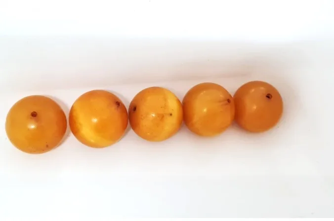 חרוזי ענבר דחוס