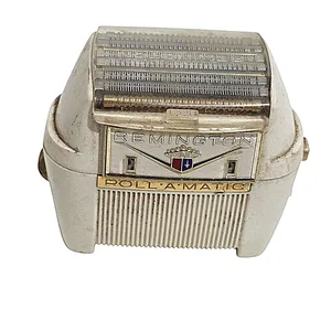 מכונת גילוח חשמלית וינטג'  מדגם - REMINGTON ROLL-A-MATIC